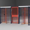 2 full height turnstiles with a full height gate between them in a custom orange and blue high gloss powder coat colorway