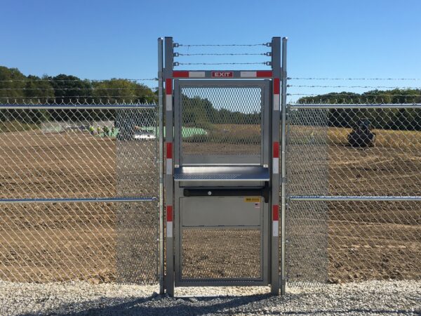 full height high security ADA gate installed in a fence line