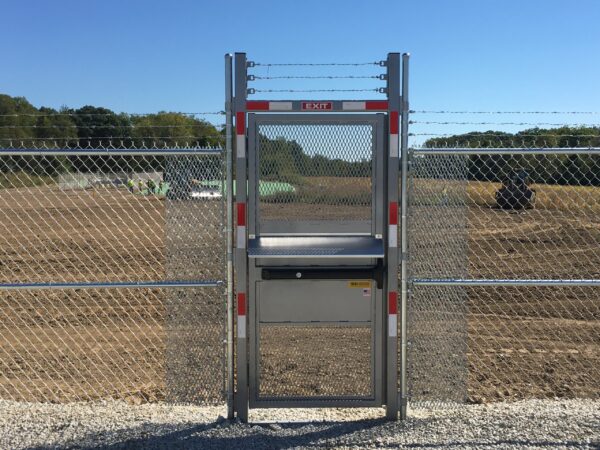 full height high security ADA gate installed in a fence line