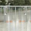 full height turnstiles and security gates installed in a line in a building