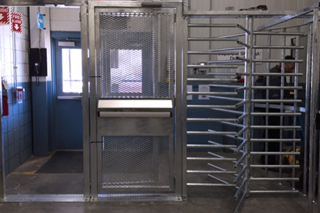 Full height turnstiles w 2 ADA gates Hayward Turnstiles security entry systems, gates. ADA complaint security access gates commercial, industrial indoor, systems manufacturers, suppliers company