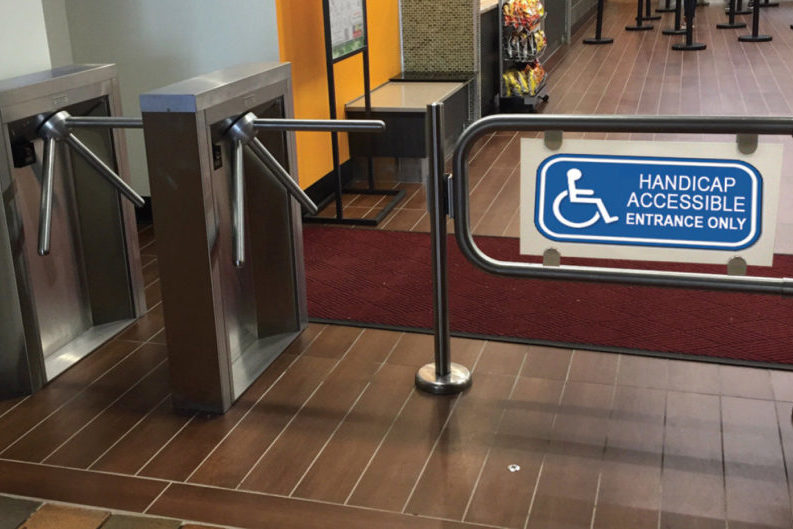 Hayward Turnstiles handicap gate swing arm security entry systems. Tripod turnstile, ADA complaint security access gates, systems manufacturers, suppliers company