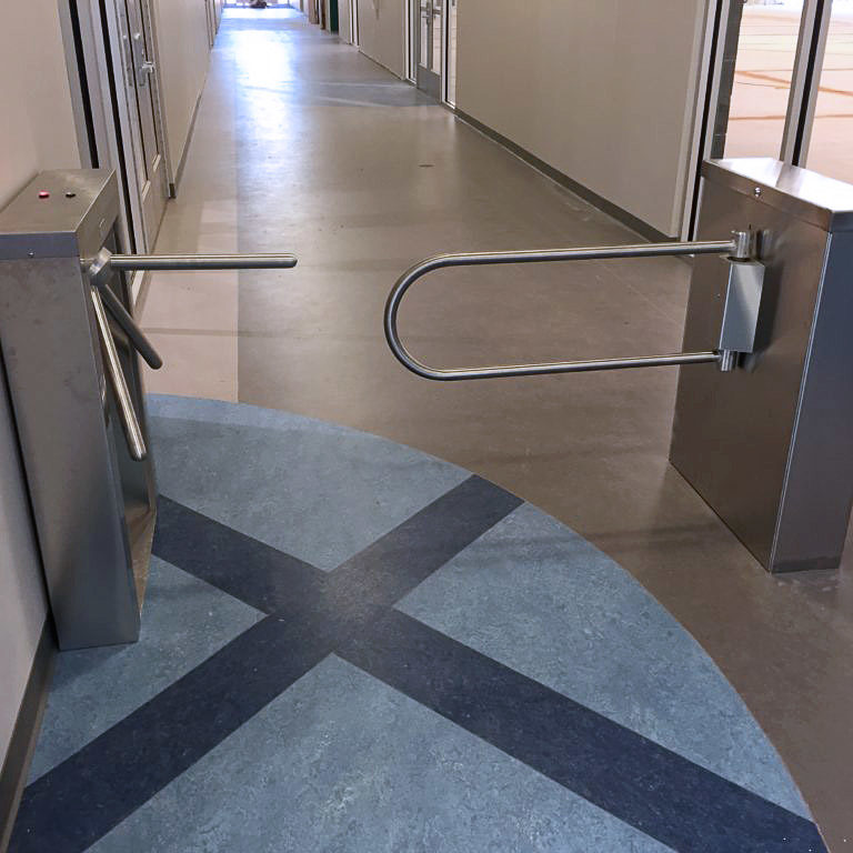 Hayward Turnstiles handicap gate swing arm security entry systems. Tripod turnstile, ADA complaint security access gates, systems manufacturers, suppliers company MR-100