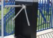 waist high turnstile at amusement park entrance