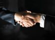 business people shaking hands in a partnership agreement