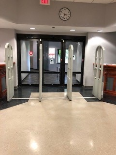 BEFORE Xavier University turnstiles xavier university library entrance with library book detection system