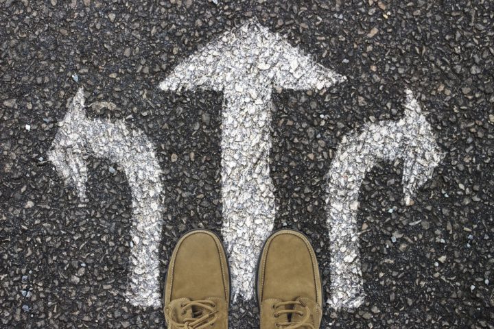 feet overlooking three arrows going in multiple direcitons