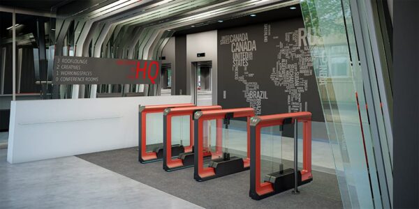 row of red custom colored optical turnstiles in an office lobby with swinging glass barriers