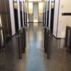 custom color black optical turnstiles at corporate entrance