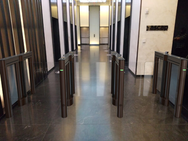 custom color black optical turnstiles at corporate entrance