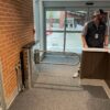 An MR200 ADA turnstile installed next to a reception desk.