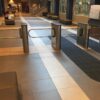 A wide MR200 ADA turnstile installed in a tiled indoor lobby.