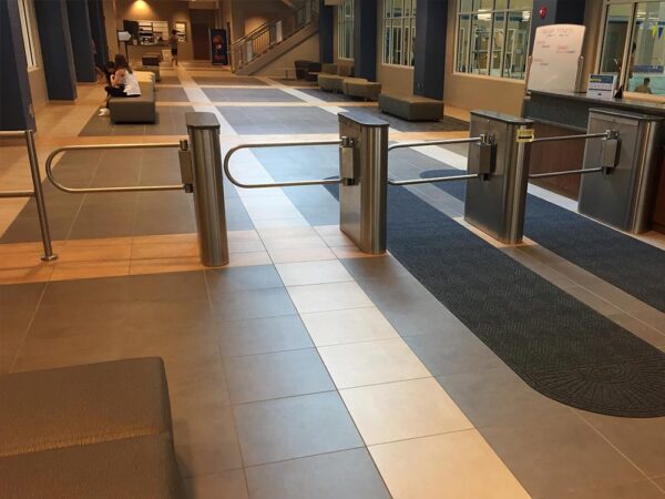 A wide MR200 ADA turnstile installed in a tiled indoor lobby.