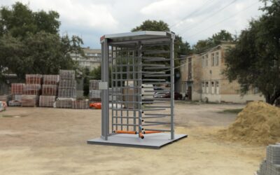 Hayward construction site full height turnstile on a portable baseplate sitting on job site dirt