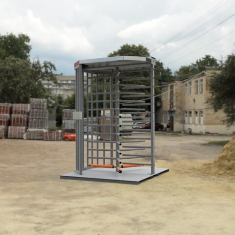 Hayward construction site full height turnstile on a portable baseplate sitting on job site dirt