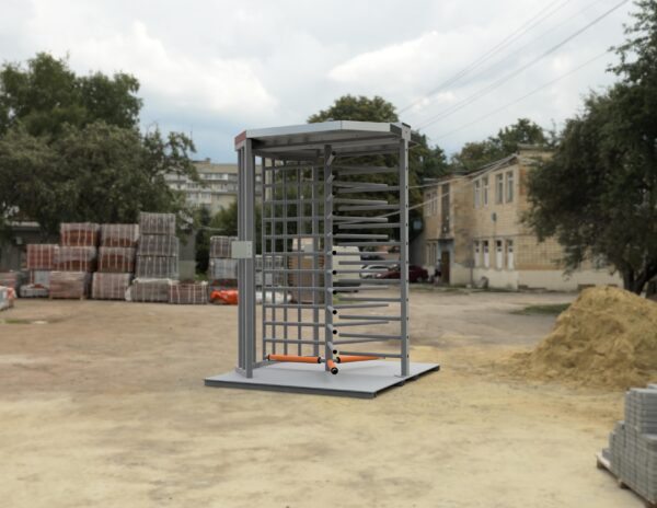 Hayward construction site full height turnstile on a portable baseplate sitting on job site dirt