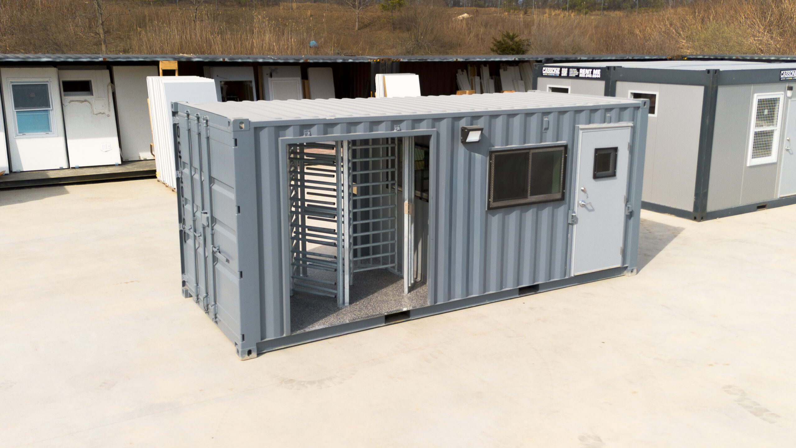 Container turnstile checkpoint configured for secure construction site access