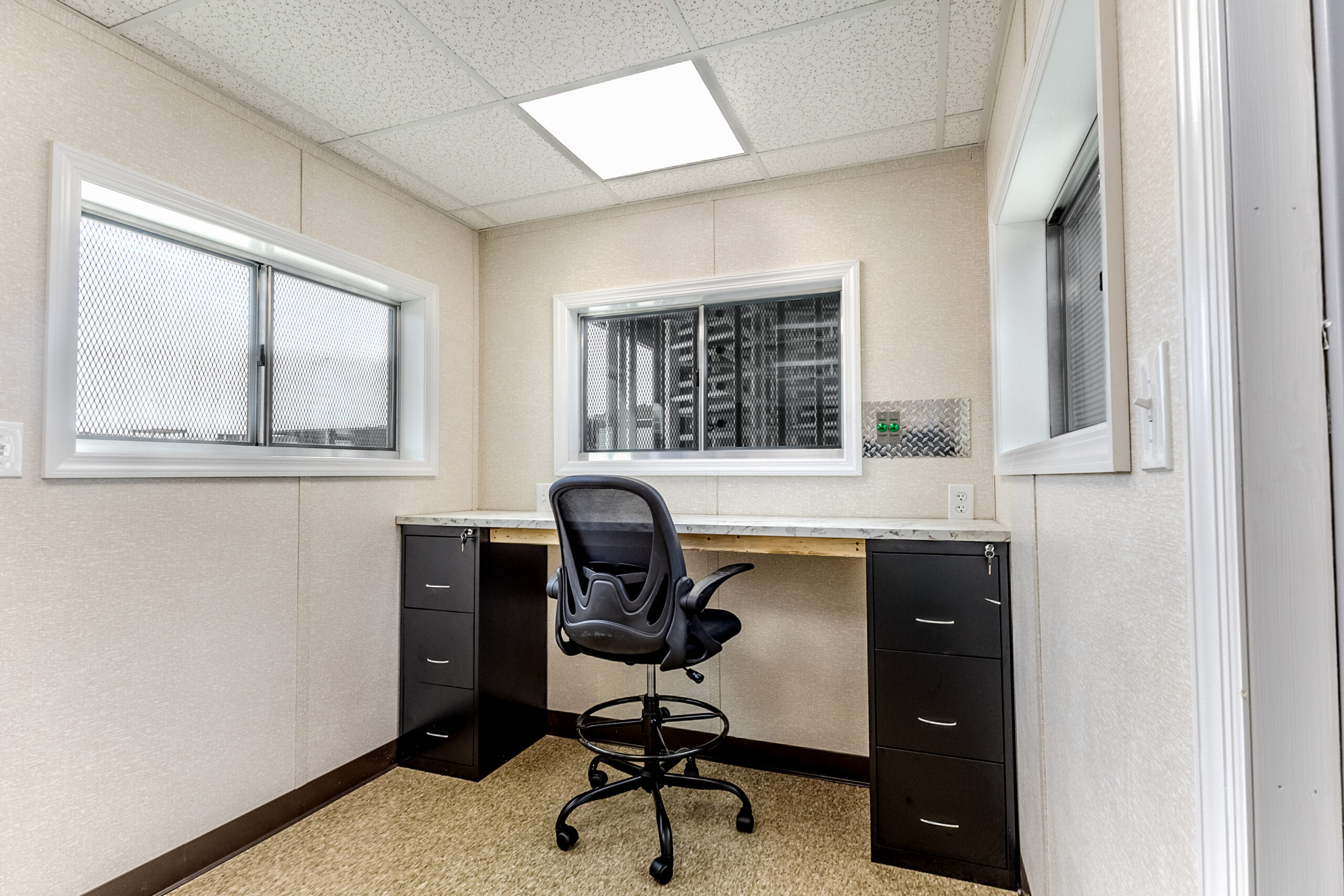Custom construction turnstile container with tandem lanes and secure office